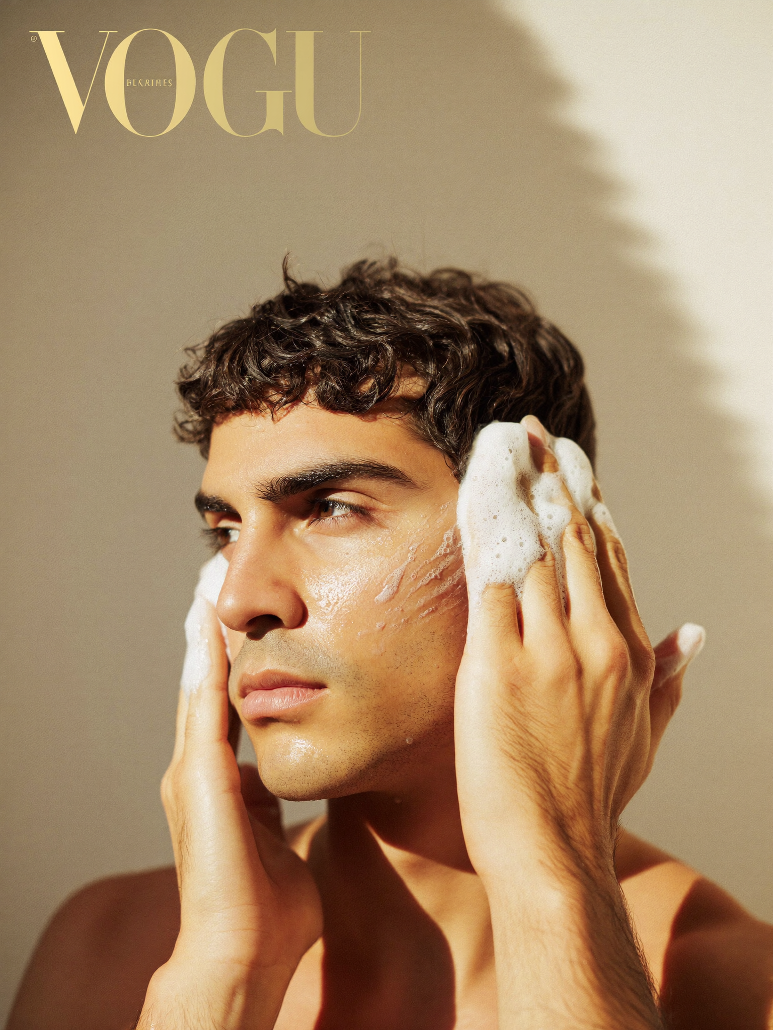 Man with mixed-heritage skin cleansing his face with Lumi Wash