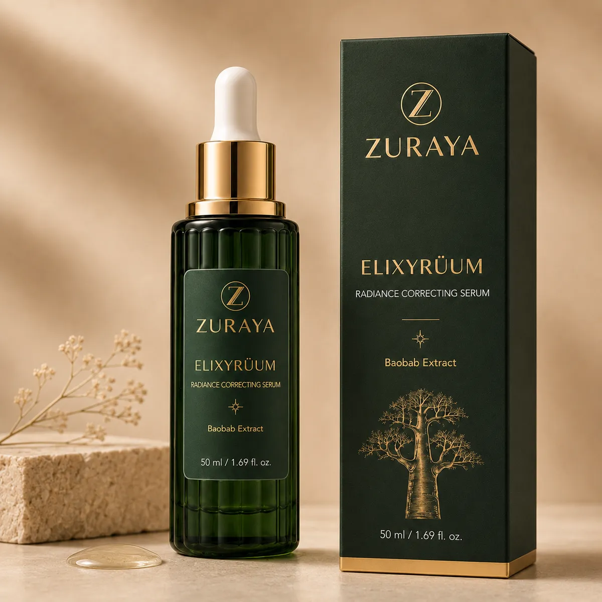 ELIXYRÜUM 50 ml bottle and its green box with a gold baobab, between stone and dried flowers