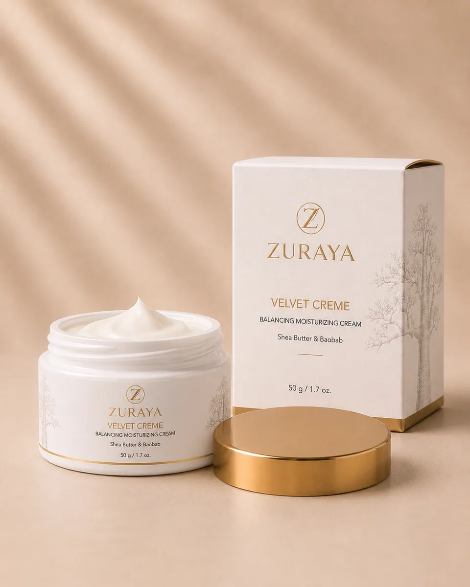 Open VELVET CREAM jar with whipped texture, next to its cream and gold box